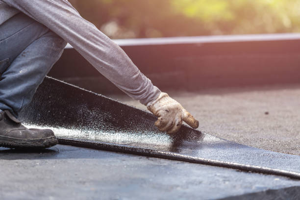 Professional Emergency Waterproofing technician working in Williamstown, KY